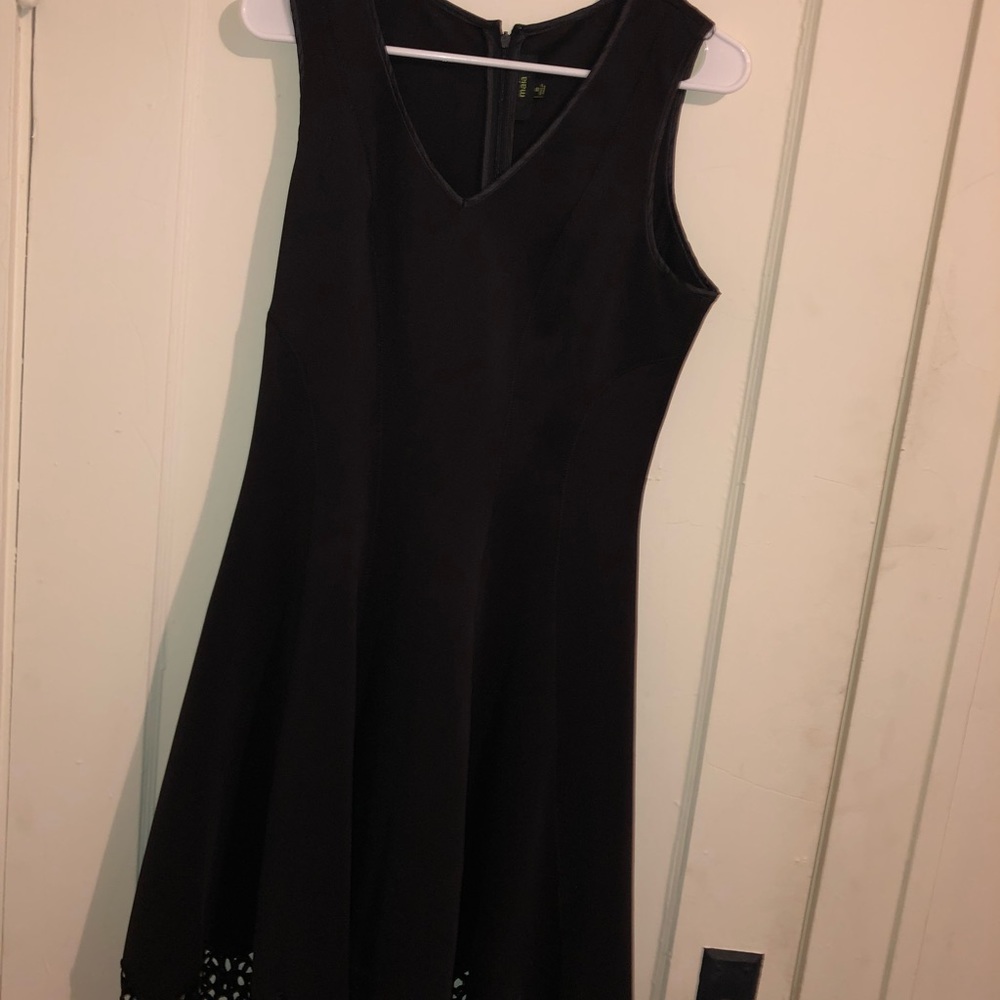 Simple black dress w fun detail